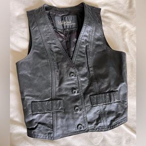 Women’s vintage leather button-up leather vest. Size 10. Excellent condition!